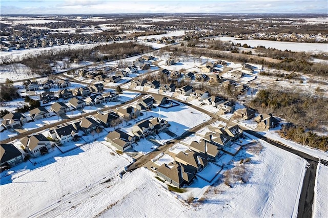 25215 W 141st Ter, Olathe, KS 66061 - snowy aerial view featuring a residential view