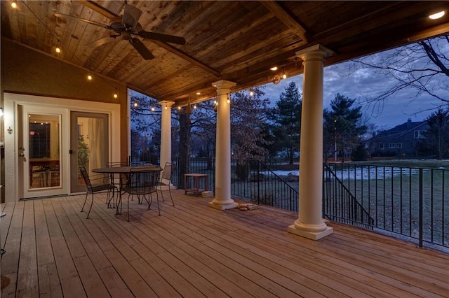 wooden terrace featuring ceiling fan