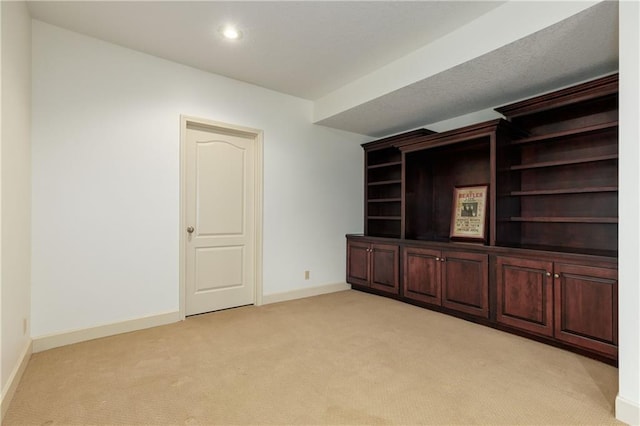 interior space featuring light colored carpet