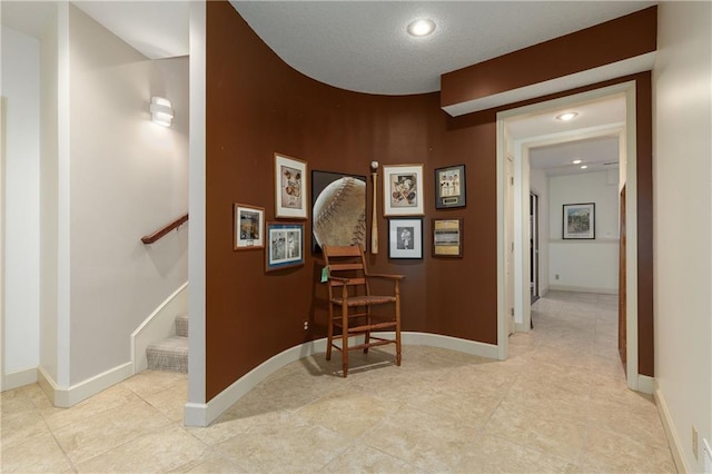 corridor featuring light tile patterned floors