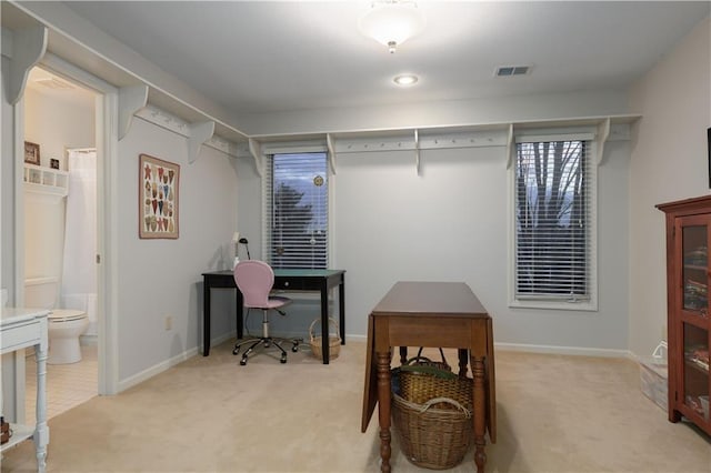 office area with light colored carpet