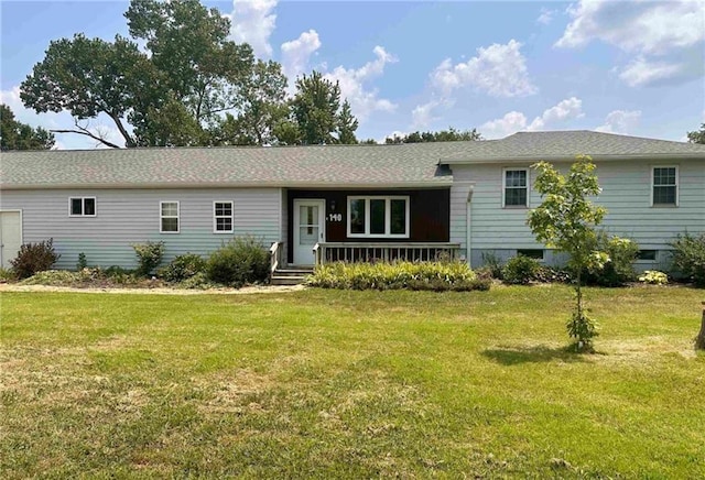 ranch-style home with a front yard