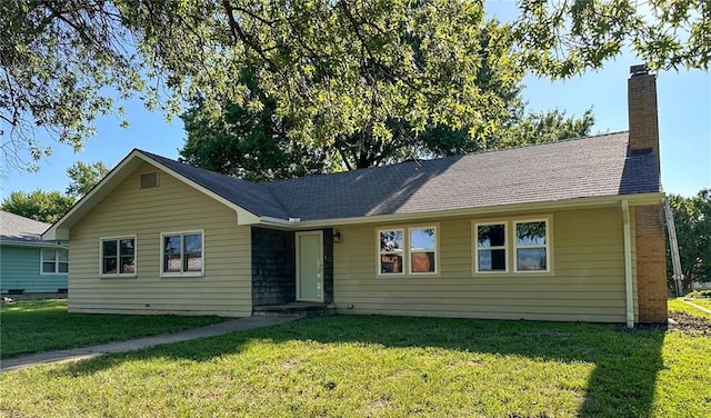 ranch-style house with a front yard