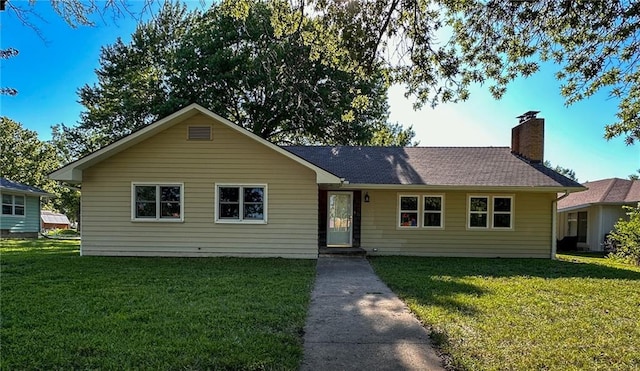 single story home with a front yard