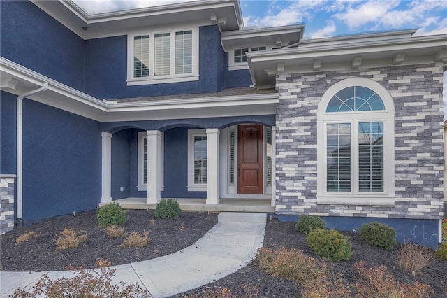 entrance to property with a porch