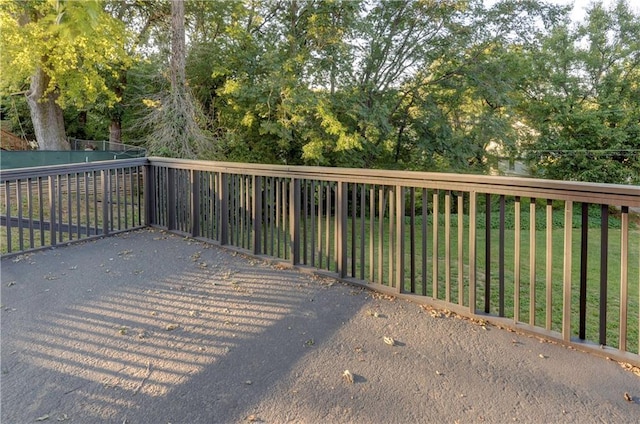 wooden deck with a yard