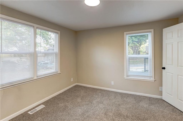 view of carpeted spare room