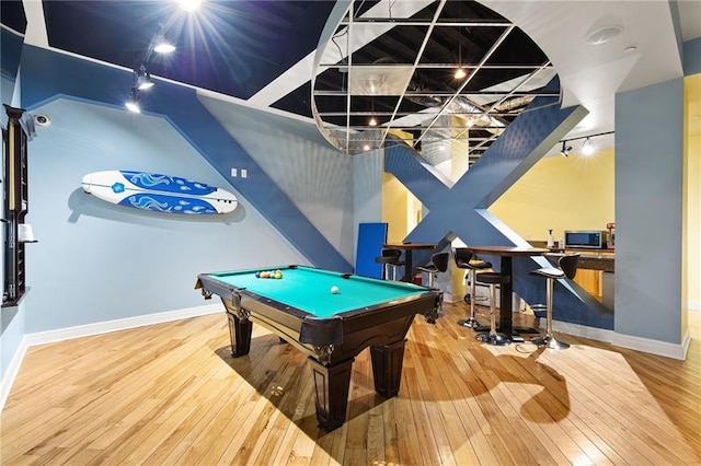 game room featuring hardwood / wood-style flooring and pool table