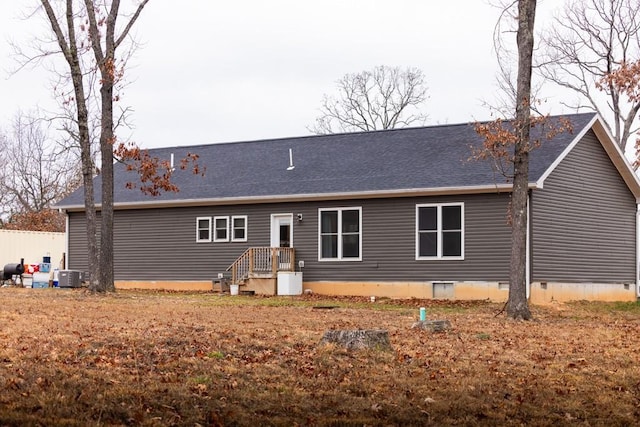 back of property with central air condition unit