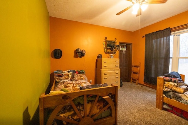 bedroom featuring carpet and ceiling fan