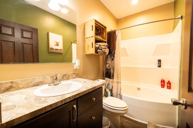 full bathroom with vanity, toilet, and shower / bath combo with shower curtain