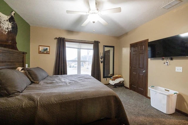 bedroom featuring ceiling fan and carpet floors