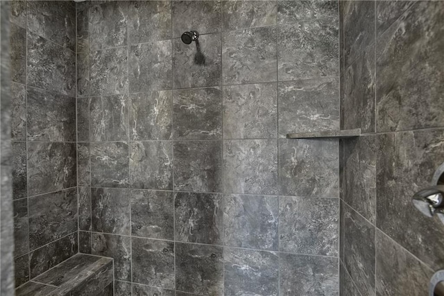 details with a tile shower