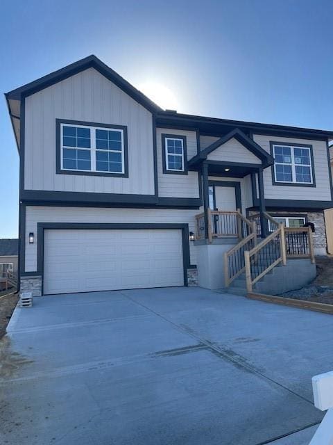 view of front of home featuring driveway and an attached garage