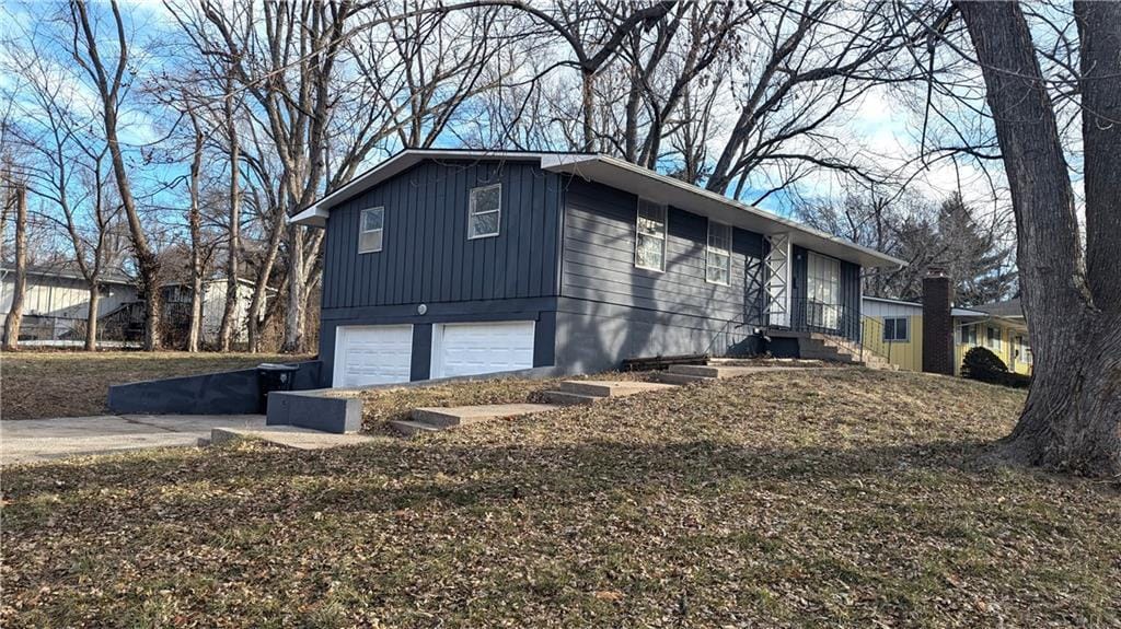 view of property exterior with a garage