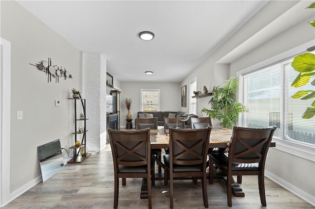 dining room with light hardwood / wood-style floors