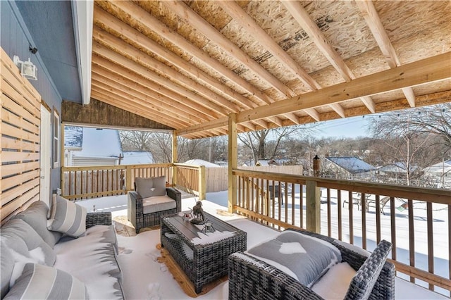 snow covered deck featuring an outdoor hangout area