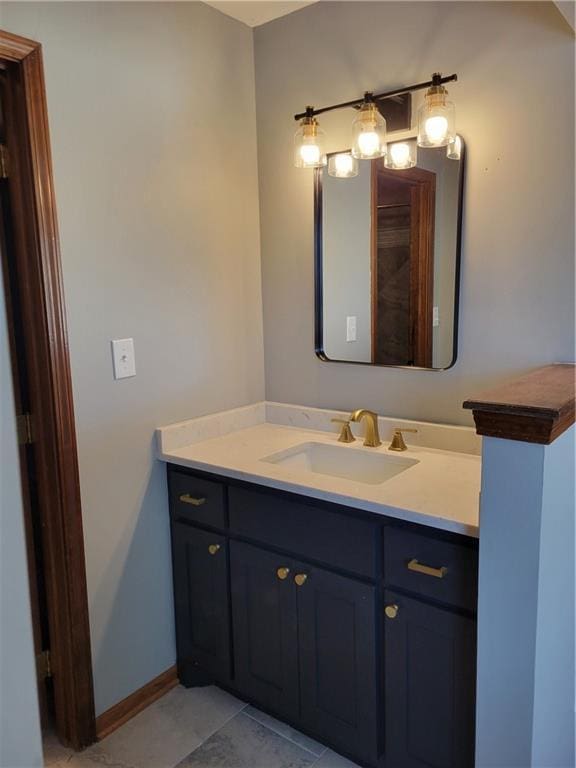 bathroom featuring tile patterned floors and vanity