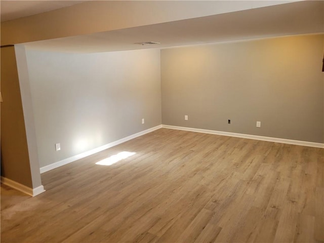 unfurnished room featuring light wood-type flooring