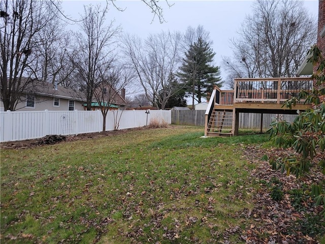 view of yard featuring a wooden deck