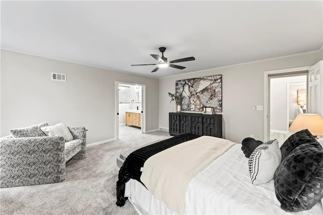 bedroom with ornamental molding, light carpet, ceiling fan, and ensuite bath