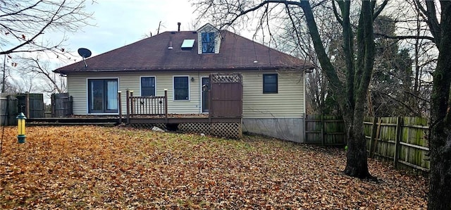 view of front of home featuring a wooden deck