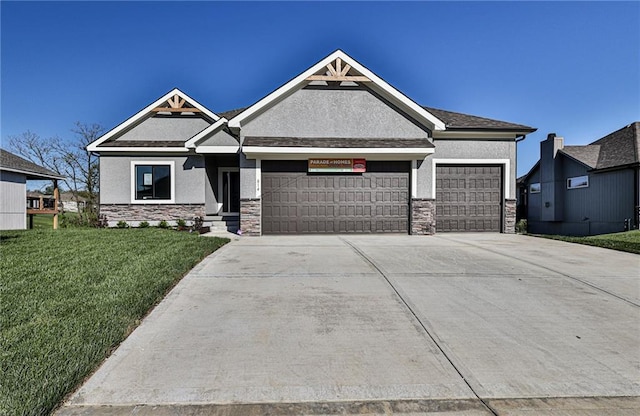craftsman house featuring stone siding, driveway, an attached garage, a front yard, and stucco siding