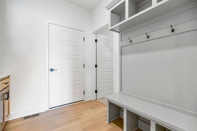 mudroom with light wood-type flooring