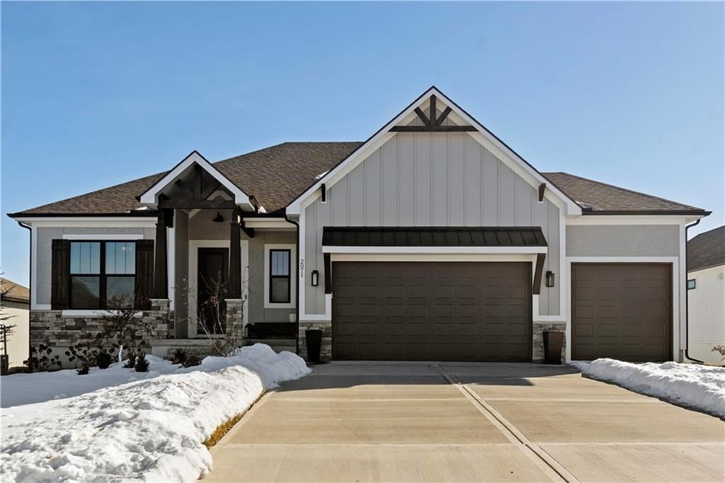 view of front of property with a garage