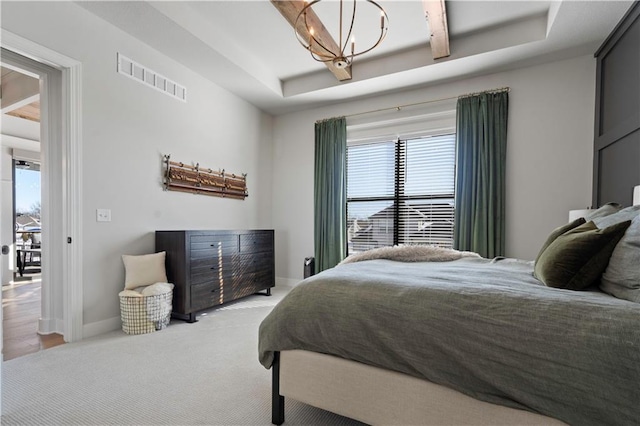 bedroom featuring carpet, a tray ceiling, beamed ceiling, and an inviting chandelier