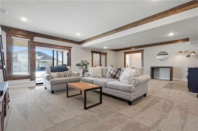 living room featuring light colored carpet and beam ceiling