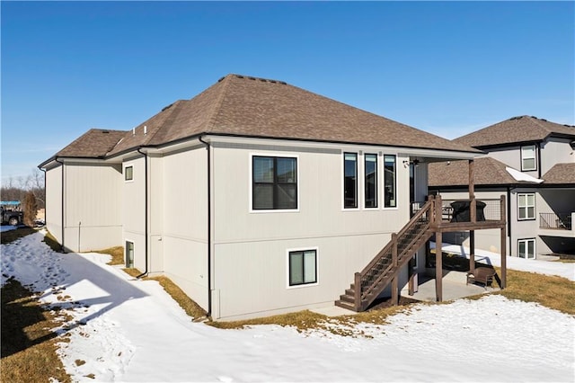 view of snow covered property