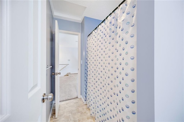 bathroom featuring walk in shower