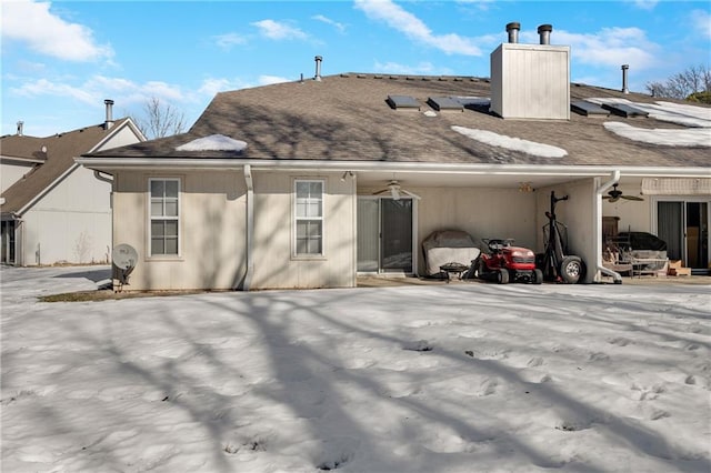 back of property featuring ceiling fan