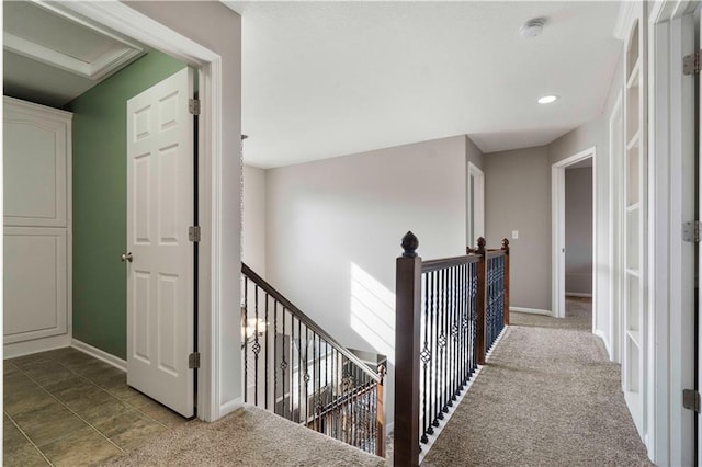 corridor featuring carpet floors