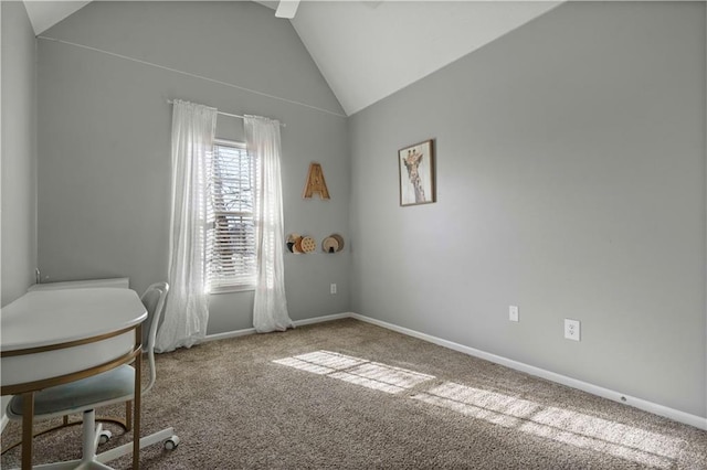 unfurnished office featuring lofted ceiling and carpet floors