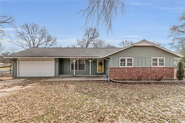 single story home with a garage