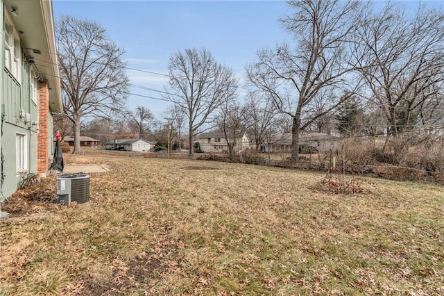 view of yard featuring central AC unit