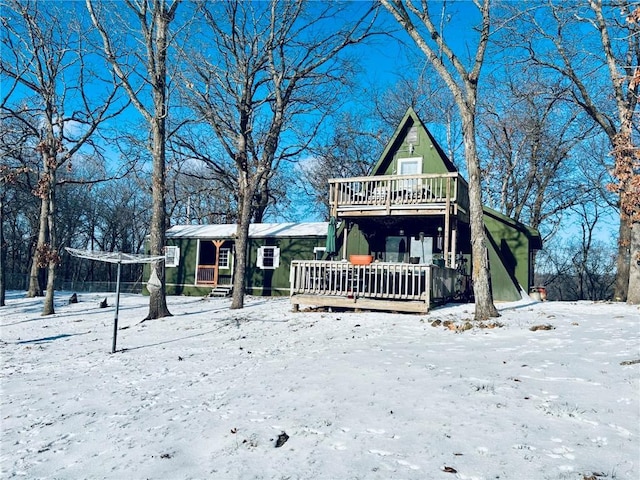 view of front of home with a wooden deck