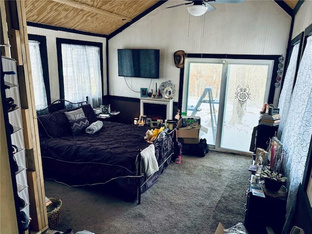 bedroom featuring carpet flooring, ceiling fan, wooden ceiling, and multiple windows