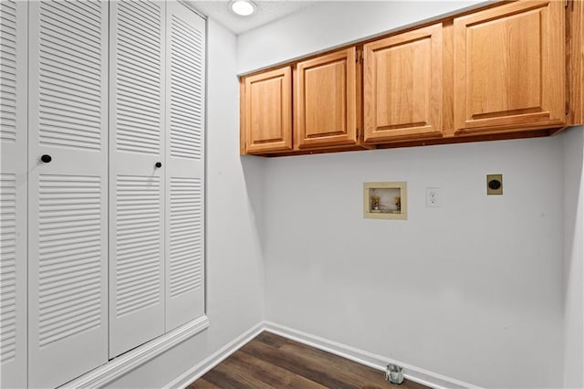 washroom with a textured ceiling, cabinets, dark wood-type flooring, electric dryer hookup, and washer hookup