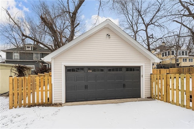 view of snow covered garage