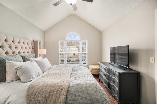 carpeted bedroom featuring ceiling fan and lofted ceiling