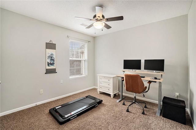 office with ceiling fan, carpet floors, and a textured ceiling