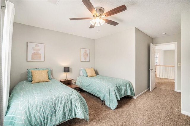 bedroom featuring ceiling fan and carpet flooring