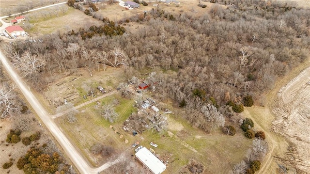 birds eye view of property with a rural view