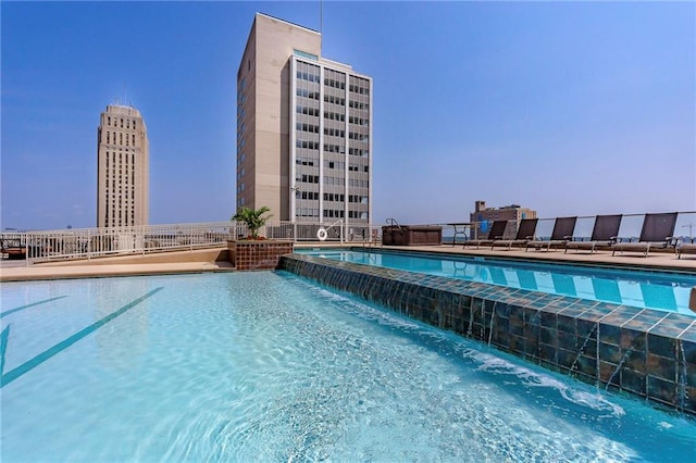 view of pool featuring pool water feature