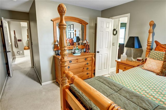 bedroom featuring light colored carpet