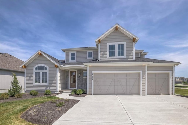 view of front of property featuring a garage