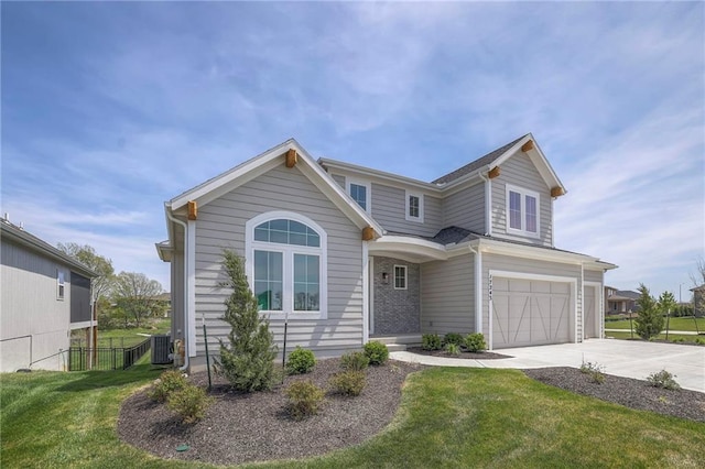 front of property with cooling unit, a front lawn, and a garage